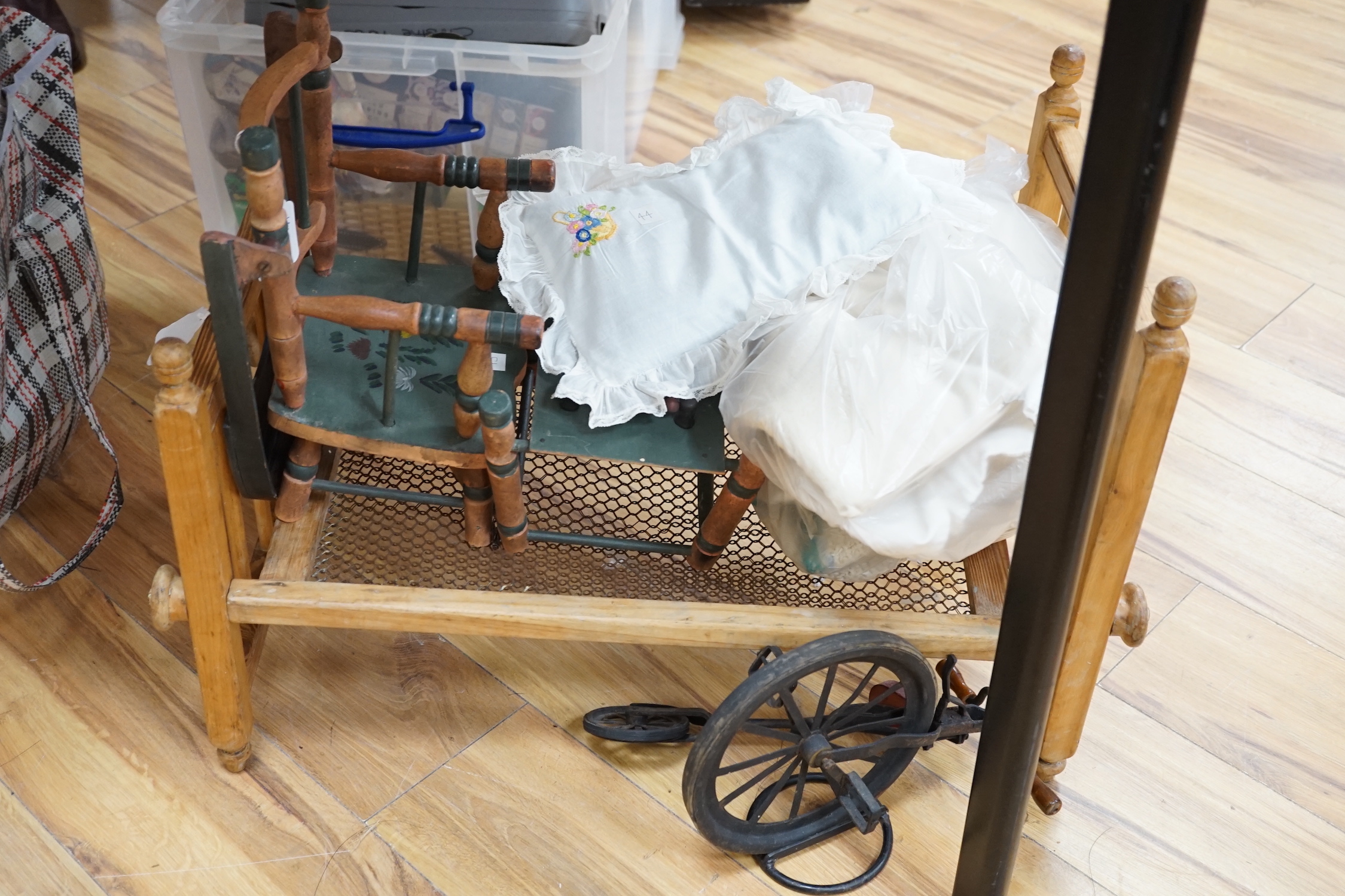 A tall mahogany chair for a doll, together with six pieces of doll's furniture including a chaise longue